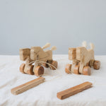 Handmade Wooden Pull-Along Horse Toy with a natural pine wood body, teak wood wheels, and a pull-along string, designed for kids aged 3+