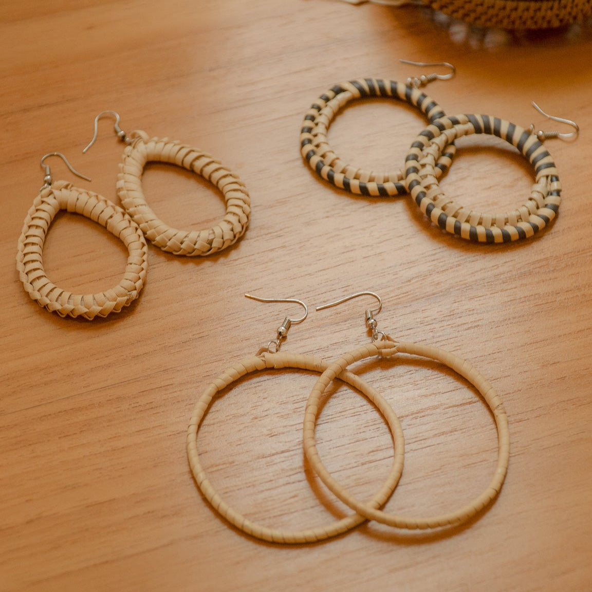 Angel loop rattan earring in beige and black, handcrafted eco-friendly artisan jewellery