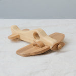 Handmade Wooden Plane Toy for kids aged 3+, crafted with a natural pine body and teak wood wings, featuring smooth edges and a unique two-tone design