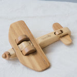 Handmade Wooden Plane Toy for kids aged 3+, crafted with a natural pine body and teak wood wings, featuring smooth edges and a unique two-tone design