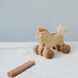 Handmade Wooden Pull-Along Horse Toy with a natural pine wood body, teak wood wheels, and a pull-along string, designed for kids aged 3+