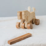 Handmade Wooden Pull-Along Horse Toy with a natural pine wood body, teak wood wheels, and a pull-along string, designed for kids aged 3+